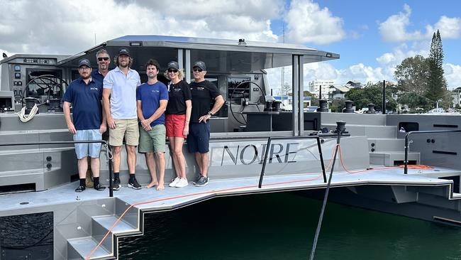 Cure Marine CEO Carl Bird and team with new owners Allan and Michele Larkin. Picture: Contributed