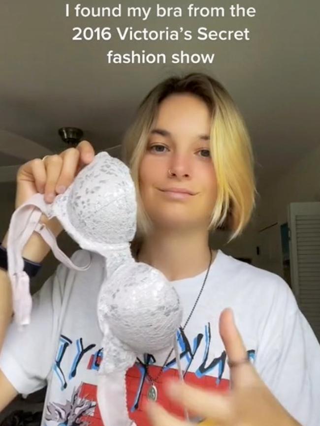 Bridget Malcolm with the bra she wore in the Victoria’s Secret Fashion Show. Picture: TikTok