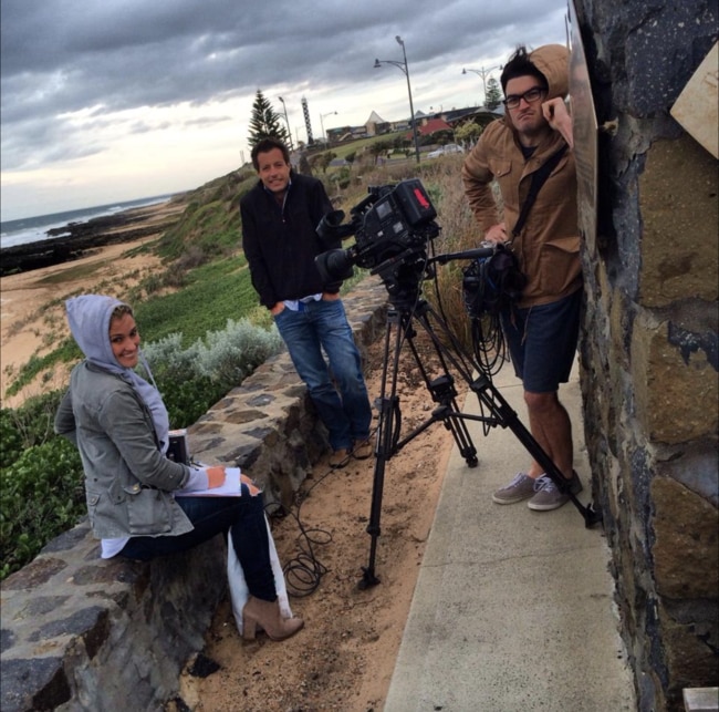 Executive producer Charlotte Shallcross working in windy conditions with actor Dan Paris. Picture: Supplied