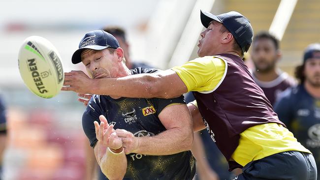 Scott Drinkwater clashes with possible new halves partner Michael Morgan. Picture: Matt Taylor.