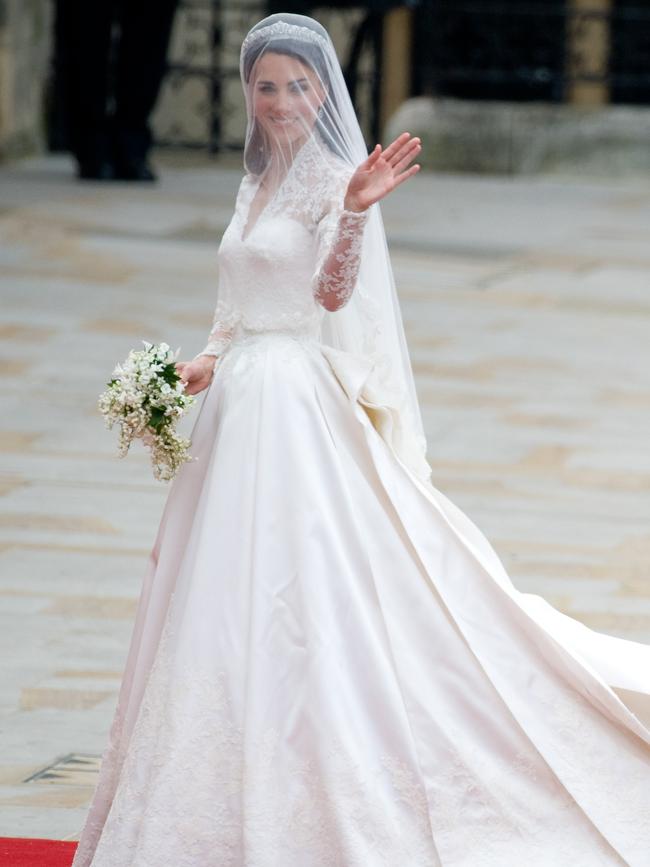 Catherine Middleton arrives to attend her Royal Wedding to Prince William at Westminster Abbey on April 29, 2011 wearing Alexander McQueen by Sarah Burton.