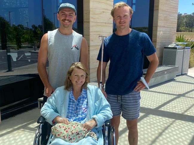 Tom and Mike Mortimer with mother Jackie just before she was discharged from hospital.