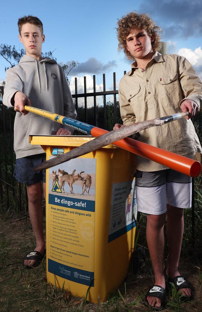 NSW visitors Toby McGrath, 15, and Bailey Kotzur, 16, with their dingo sticks. Picture: Liam Kidston