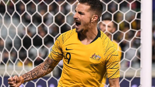 Jamie Maclaren of Australia celebrates after scoring his third goal during the FIFA World Cup Asian Qualifiers match between the Australian Socceroos and Nepal at GIO Stadium in Canberra, Thursday, October 10, 2019. (AAP Image/James Gourley) NO ARCHIVING, EDITORIAL USE ONLY.