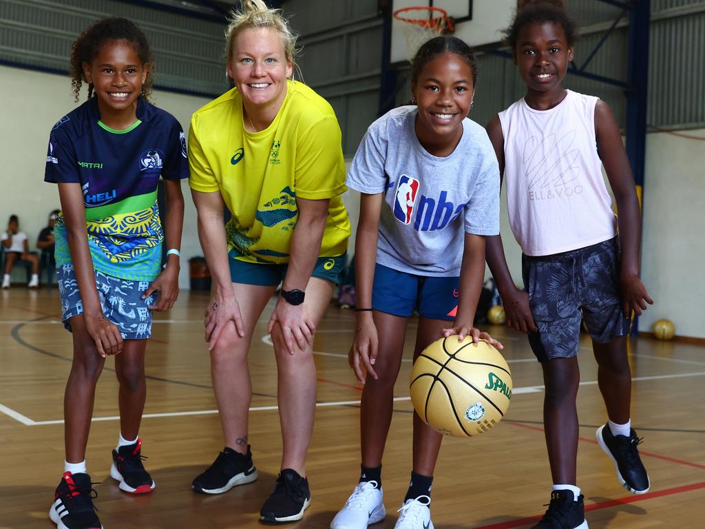 Olympian Rowie Webster with Thursday Islanders (from left) Lalya Viti, Pele Ahwand and Keisha Mosb. Picture: Chris Hyde/Getty Images