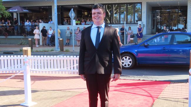 The students from Urangan State High School celebrating their formal.