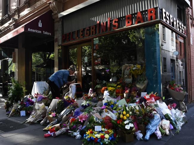 Mourners pay their respects to Sisto Malaspina, co-owner of Pellegrini's Espresso Bar. Picture: AAP