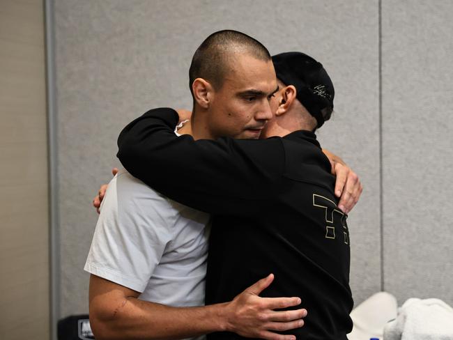 Tim and Kostya Tszyu share a hug ahead of the fight. Picture: Tom Pombart/No Limit Boxing