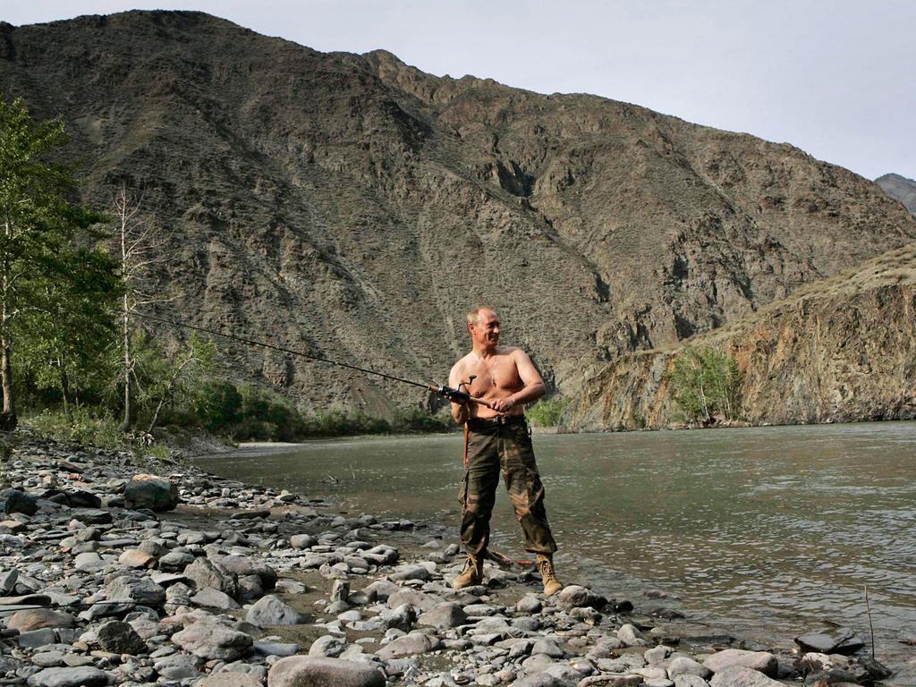 Putin enjoys the outdoors with his guns out and rod waving in the brisk Russian wind.