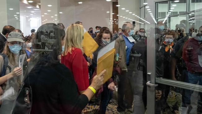 Trump supporters tried to enter the room where absentee ballots for the 2020 general election were being counted in Detroit, Michigan. Picture: Seth Herald/AFP