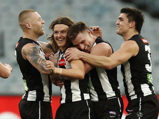 MELBOURNE, AUSTRALIA - JULY 31: Jack Ginnivan of the Magpies celebrates a goal during the round 20 AFL match between Collingwood Magpies and West Coast Eagles at Melbourne Cricket Ground on July 31, 2021 in Melbourne, Australia. (Photo by Darrian Traynor/Getty Images)