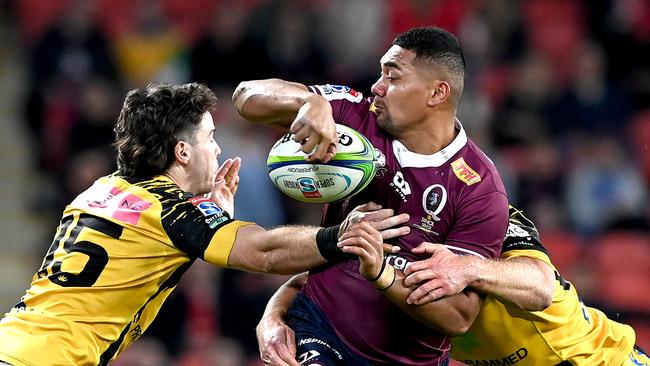 Chris Feauia-Sautia of the Reds attempts to offload during the round three Super Rugby AU match between the Reds and Force at Suncorp Stadium on July 17, 2020 in Brisbane, Australia. (Photo by Bradley Kanaris/Getty Images)