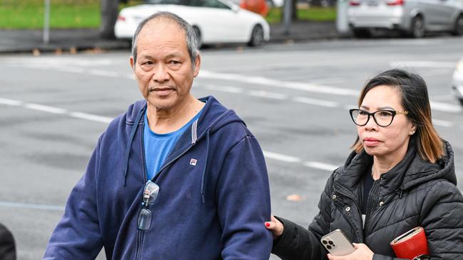 Truck driver Sang Van Huynh, left, leaves the Adelaide Magistrates Court with a supporter after an earlier hearing. Picture: NCA NewsWire/Brenton Edwards