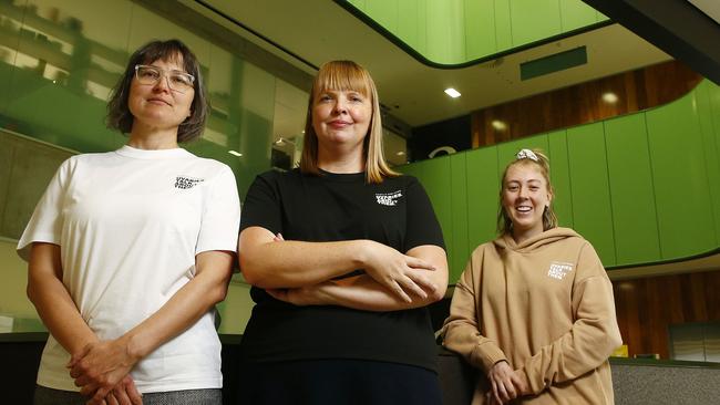 Dr Kristina Warton, Associate Professor Dr Caroline Ford and Research Assistant Teagan Fisher wearing the Camilla and Marc designs. Picture: John Appleyard