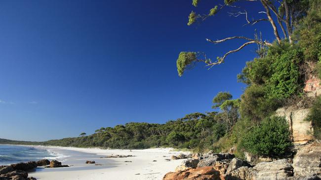 Stop to cool off on your walk at Hyams Beach, Jervis Bay.