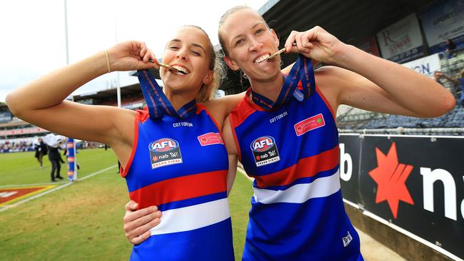 Bailey Hunt and Lauren Spark celebrate the Bulldogs premiership. Picture: Mark Stewart