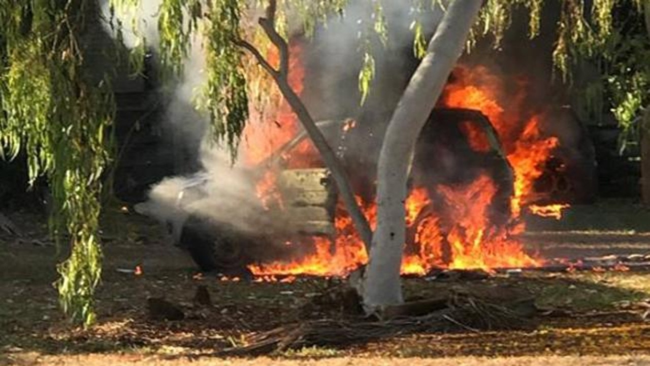 (Generic image) Car on fire in bushland. Picture: Supplied