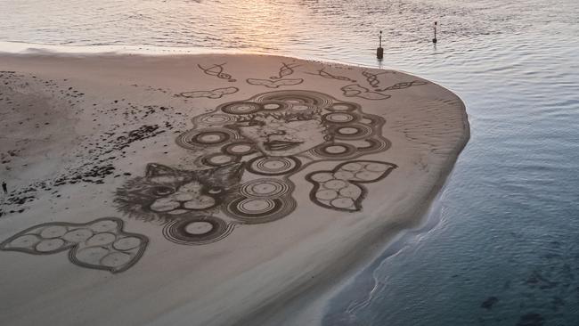 A 100m sand sculpture of Taylor Swift and her cat on the Bellarine Peninsula coast line. Picture: James Anderson/Turbo360.au