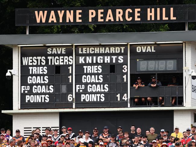 SYDNEY, AUSTRALIA - MARCH 12: Staff watch from the scoreboard during the round two NRL match between Wests Tigers and Newcastle Knights at Leichhardt Oval on March 12, 2023 in Sydney, Australia. (Photo by Cameron Spencer/Getty Images)