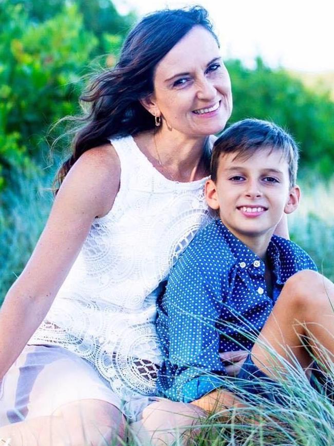 Lynne Stewart with her son Alex Stuckings – she is stuck in the UK as governments fight over removing the cap on Australian citizens arriving back into the country.