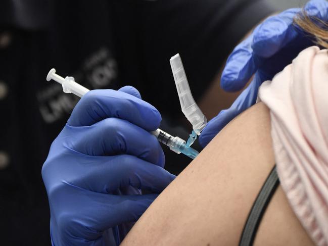 A nurse administers the Moderna vaccine. Picture: Patrick T. Fallon/AFP