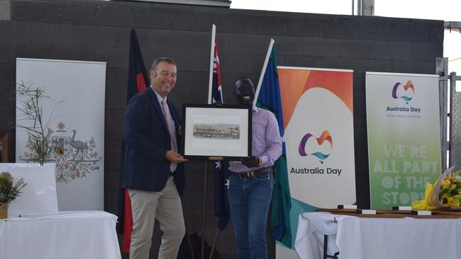 Elijah Buol OAM accepting a gift on behalf of the Maranoa Region for his attendance at the Awards. Picture: Chloe Cufflin.