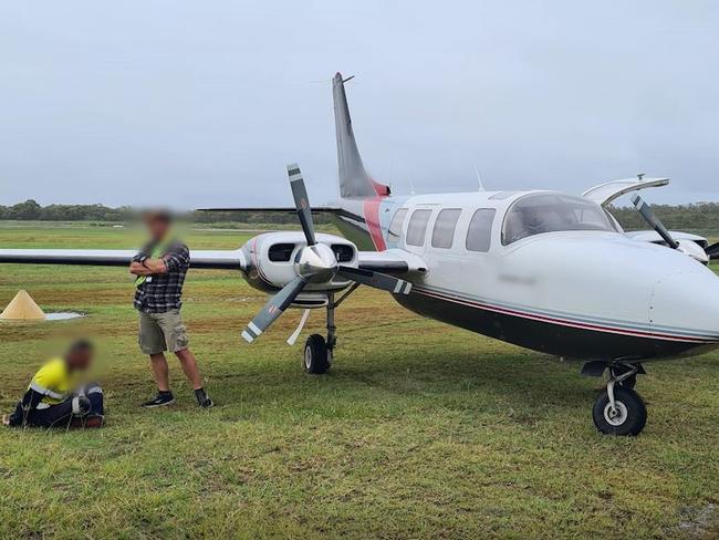 Queensland Police found cash and cannabis hidden in a light plane that arrived in Brisbane from Melbourne. Picture: Queensland Police