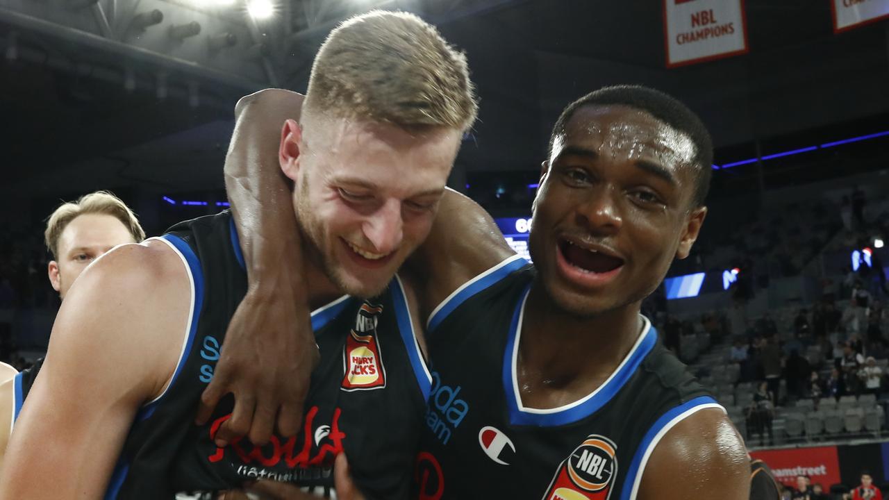 White (L) celebrates with Caleb Agada (R) at full-time. (Photo by Darrian Traynor/Getty Images)