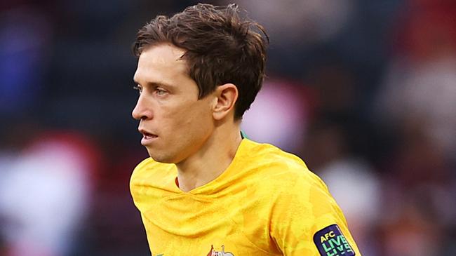 DOHA, QATAR - JANUARY 13: Craig Goodwin of Australia runs with the ball during the AFC Asian Cup Group B match between Australia and India at Ahmad Bin Ali Stadium on January 13, 2024 in Doha, Qatar. (Photo by Robert Cianflone/Getty Images)