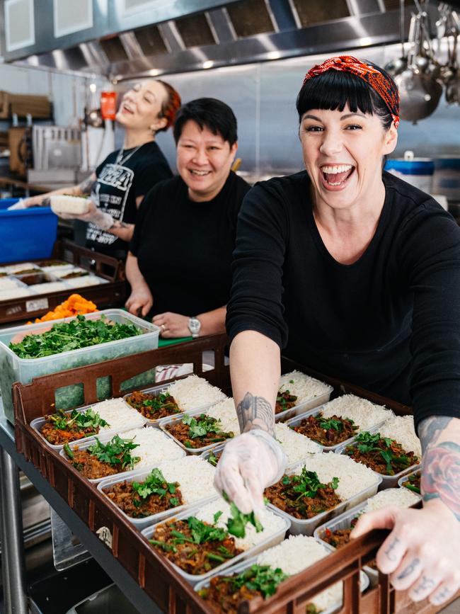 Vegan chefs Shannon Martinez, Tamara Scoulidis and Jerry Mai preparing meals for residents in public housing during lockdown.