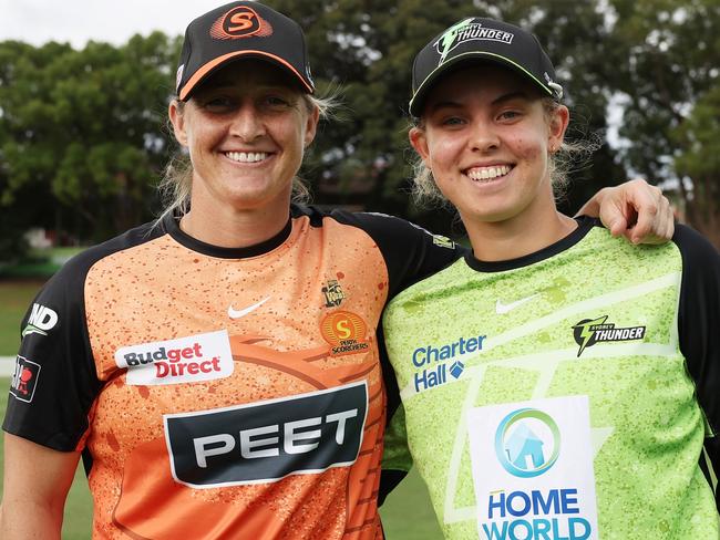 SYDNEY, AUSTRALIA - NOVEMBER 12:  Sophie Devine, captain of the Scorchers and Phoebe Litchfield, captain of the Thunder pose after taking part in the bat flip during the WBBL match between Sydney Thunder and Perth Scorchers at Drummoyne Oval on November 12, 2024, in Sydney, Australia. (Photo by Matt King/Getty Images)