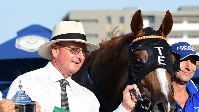 Trainer Toby Edmonds with Hard Empire and the spoils of victory.