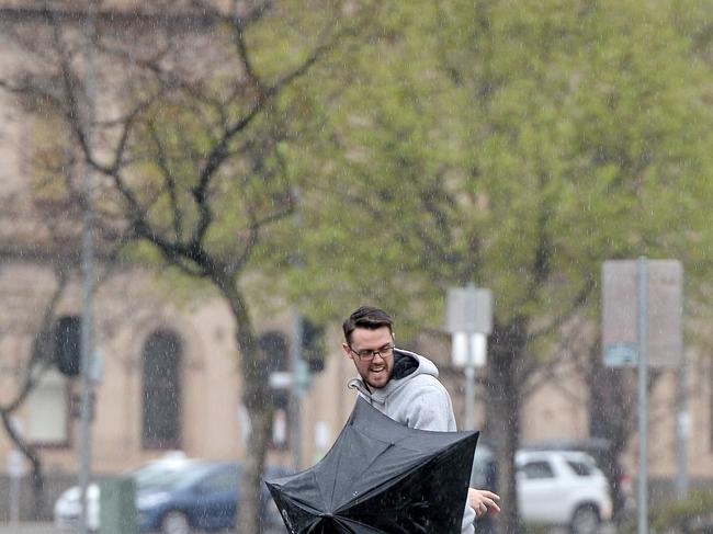 Wet weather in Victoria Square, Adelaide. Picture: Greg Higgs
