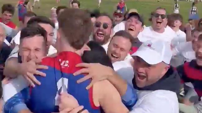 Lockleys fans mob Ben Haren to celebrate his 100th goal of the season. Supplied, Lockleys Football Club