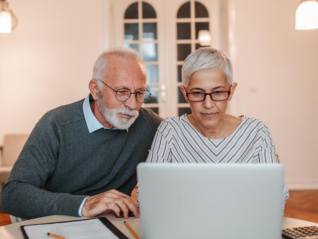 Developing Queensland - retirement - Senior couple browsing the internet together.