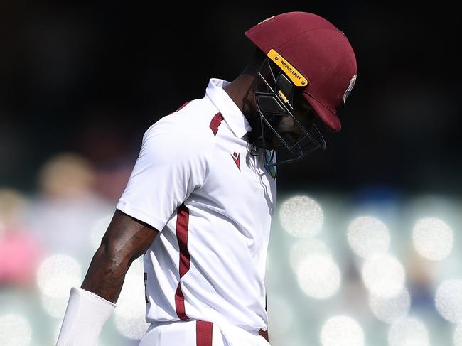 ADELAIDE, AUSTRALIA - JANUARY 18: Kirk McKenzie of the West Indies walks from the field after being dismissed by Cameron Green of Australia during day two of the First Test in the Mens Test match series between Australia and West Indies at Adelaide Oval on January 18, 2024 in Adelaide, Australia. (Photo by Paul Kane/Getty Images)