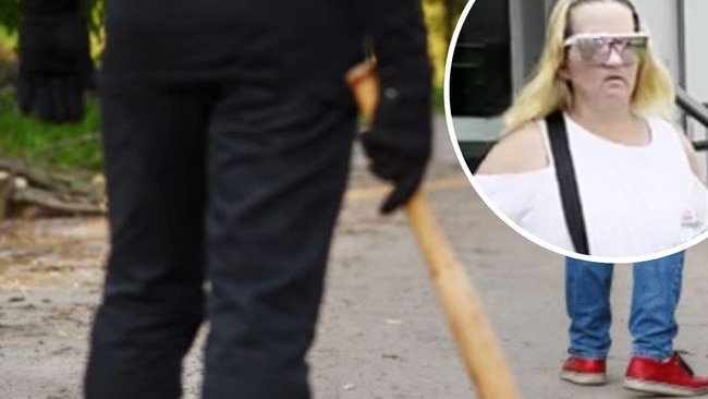 A Kingaroy woman charged with bashing a man over the head with a baseball bat and injuring a woman after a fight over a small loan has walked free.