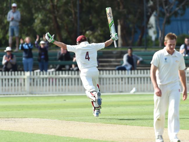 Fitzroy Doncaster captain Peter Dickson celebrates reaching 200 in the 2015-16 Premier Cricket grand final. Picture: Lawrence Pinder