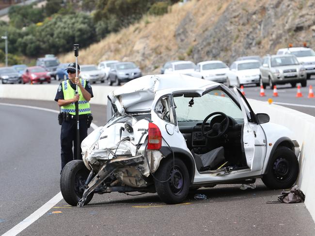 The crash on the Southern Expressway is believed to be linked to the pursuit of a stolen black Mercedes, which was ditched in Dry Creek. Picture: Stephen Laffer