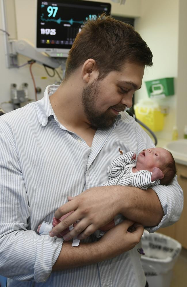 Matt Avramovic with son Hugo in the special care nursery at Townsville University Hospital.