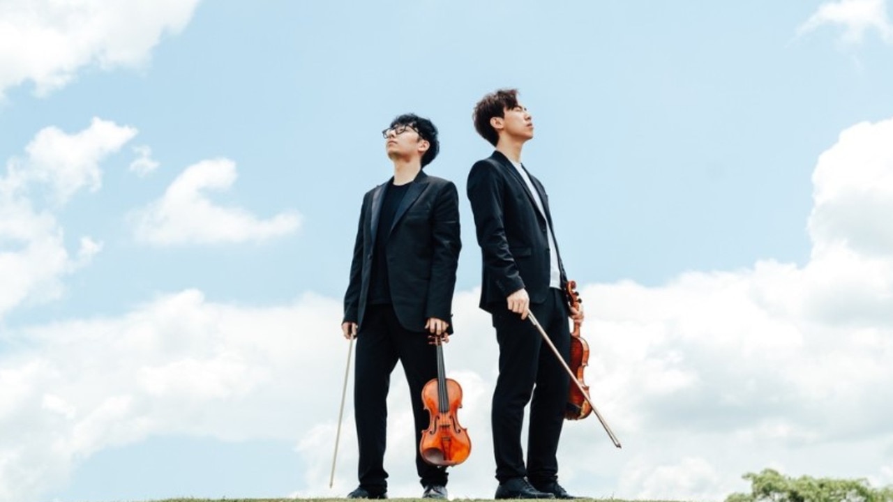 Brett Yang (left) and Eddy Chen (right) make up the musical duo TwoSet Violin. Picture: Instagram / TwoSet Violin