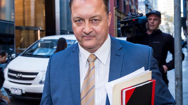 Former police officer Paul Dale leaves a hearing in relation to the Lawyer X scandal. Picture: Jake Nowakowski