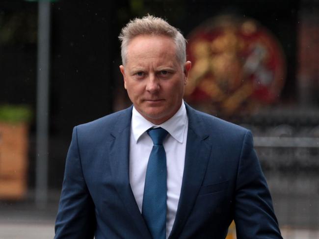 CEO and Senior Financial Advisor at Henderson Maxwell, Sam Henderson (right) arrives at the Federal Court in Melbourne, Tuesday, April 24, 2018. The financial services royal commission public hearing into financial advice continues in Melbourne. (AAP Image/Stefan Postles) NO ARCHIVING