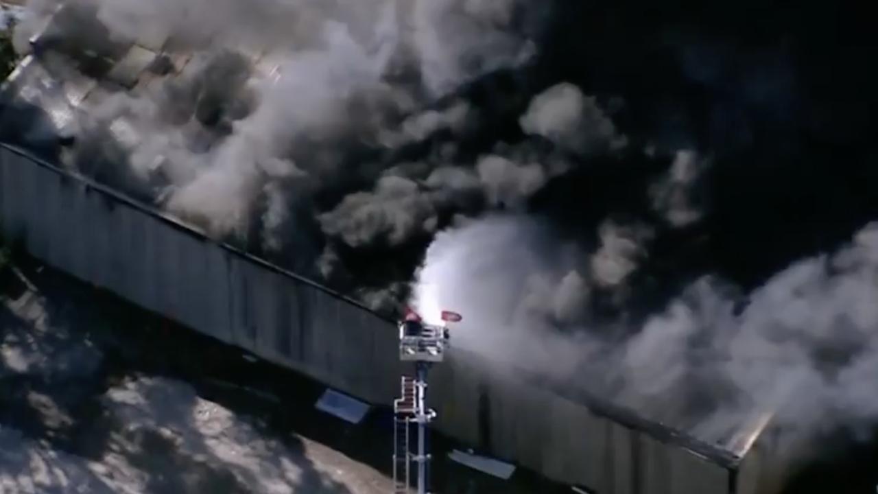 Huge blaze rips through industrial complex