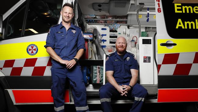 Paramedics Ben Morey (left) and Marty Flynn performed CPR on former sports reporter Peter Kogoy in September. Picture: Jonathan Ng