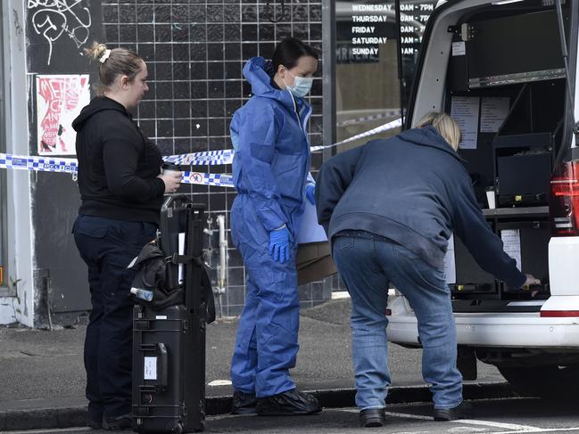 Police at the scene outside the Royal Hotel in Footscray. Picture: Andrew Henshaw