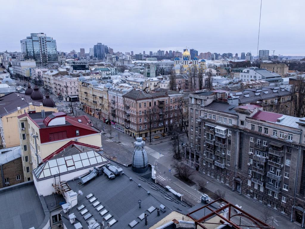 Empty streets and closed shops are seen during a curfew imposed from Saturday 5pm to Monday 8am local time on Sunday February 27, in Kyiv, Ukraine. Explosions and gunfire were reported around Kyiv as Russia's invasion of Ukraine continues. Picture: Chris McGrath/Getty Images.