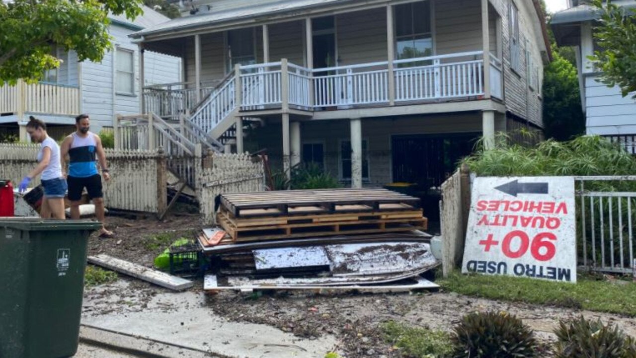 The clean-up operation has started in the inner-Brisbane suburb of Windsor, where rescues were still being undertaken overnight. Picture: Rachael Rosel