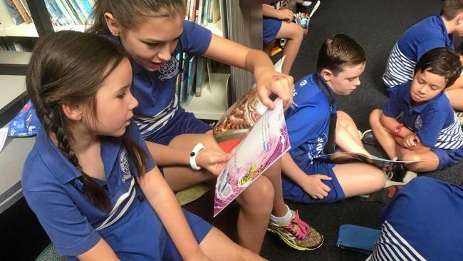 Frenchville students receive books from Rotary Clubs. Picture: contributed