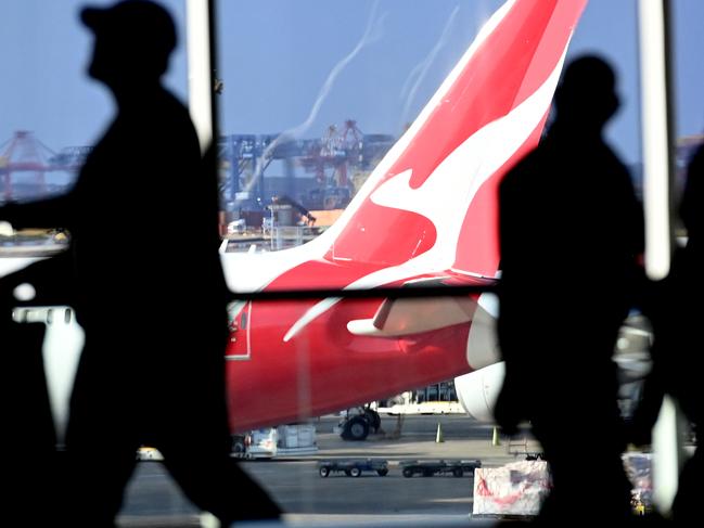 SYDNEY, AUSTRALIA - NewsWire Photos JULY 29, 2022: General scenes of a Qantas plane at the arrival gate at SydneyÃs International AirportPicture: NCA NewsWire / Jeremy Piper